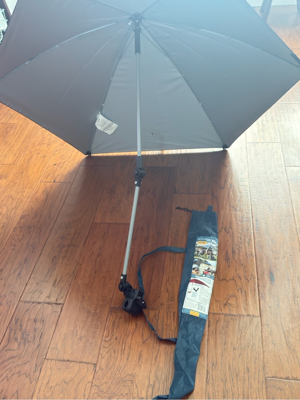 Compact Black Umbrella with Adjustable Clamp - Portable Shade Accessory